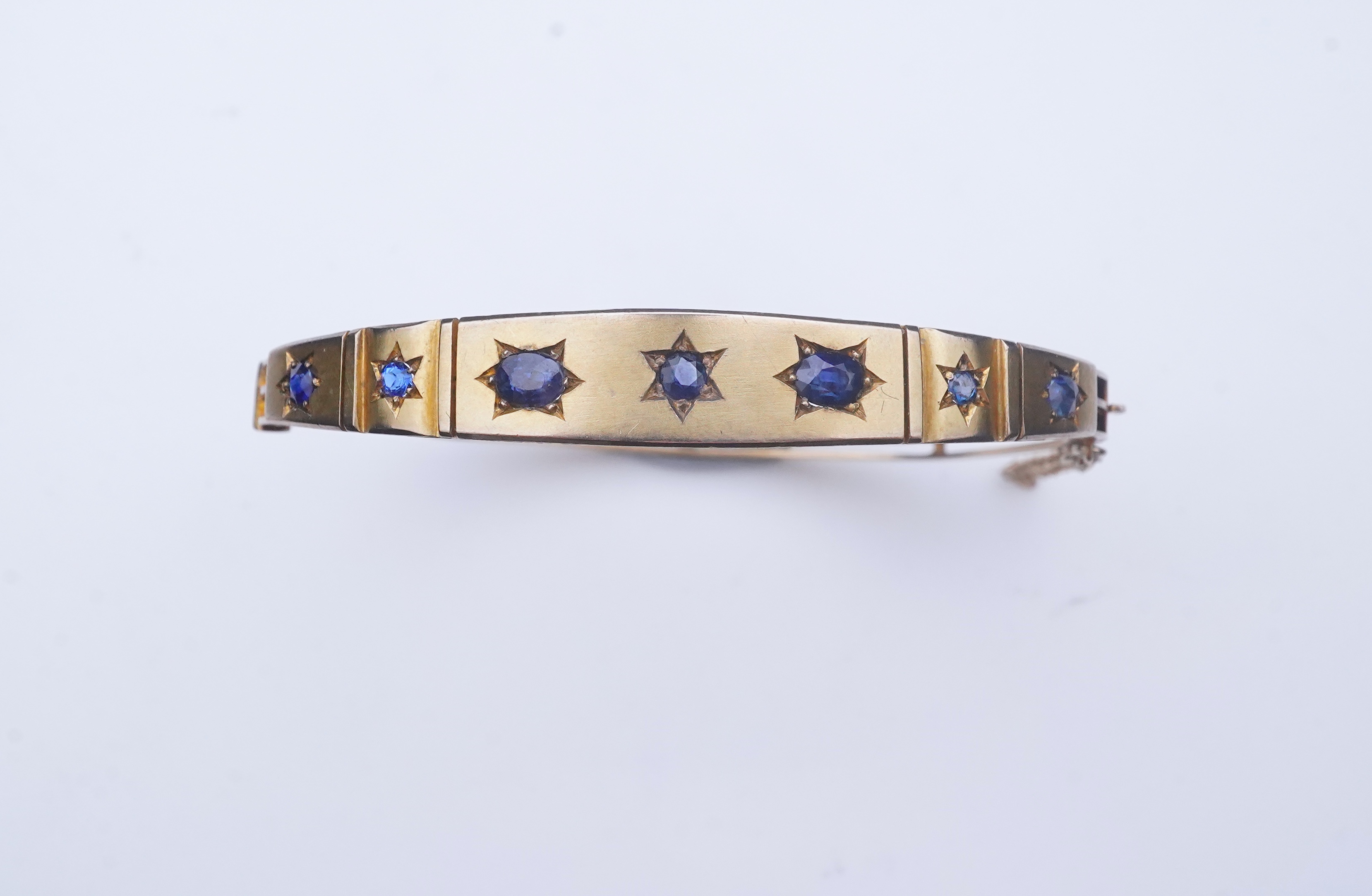 A Victorian sapphire bangle, late 19th century